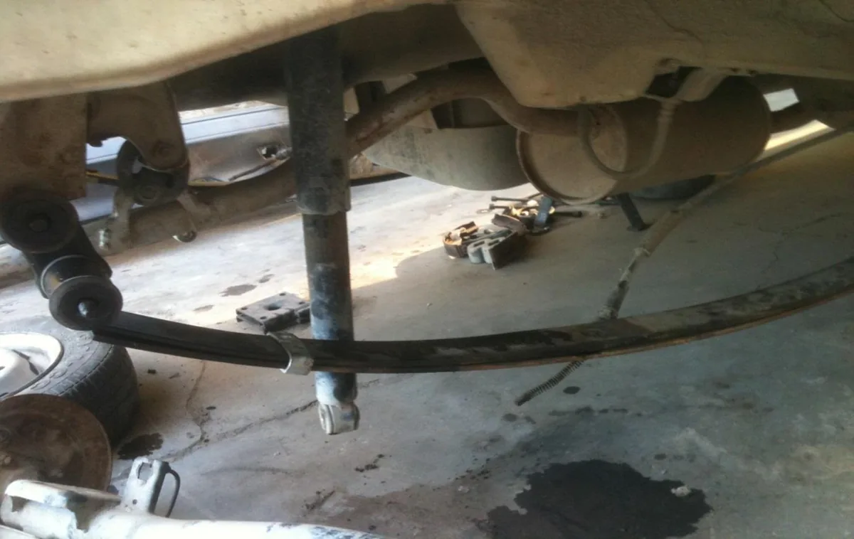 An extra leaf added to the rear spring for the added weight.